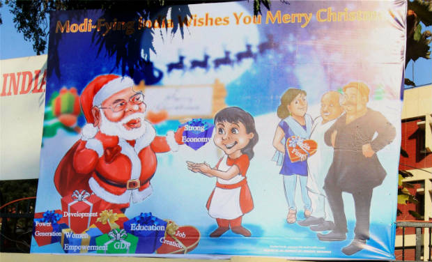 A banner in Delhi shows Gujarat Chief Minister Narendra Modi as Santa Claus on Christmas day - PTI A banner in Delhi shows Gujarat Chief Minister Narendra Modi as Santa Claus on Christmas day - PTI